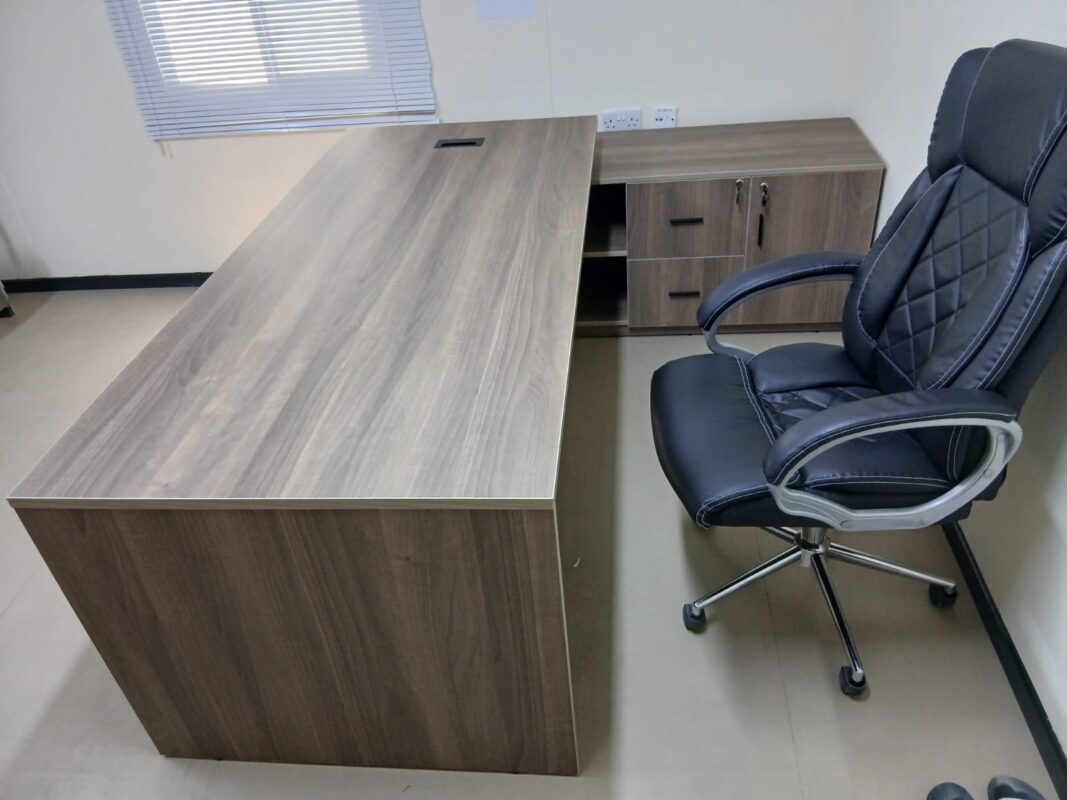 Executive office desk storage and chair installation in UAE office